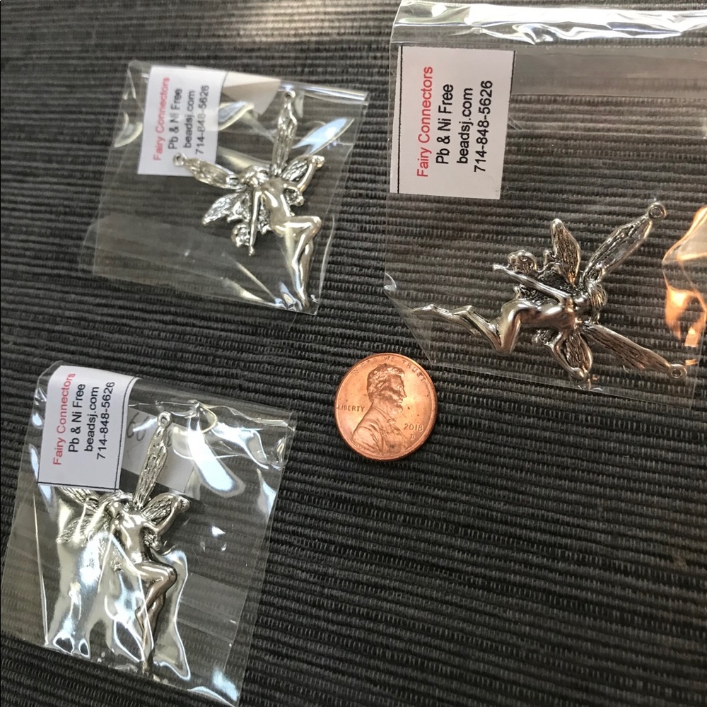 RARE SILVER METAL FAIRY PENDANTS UNIQUE